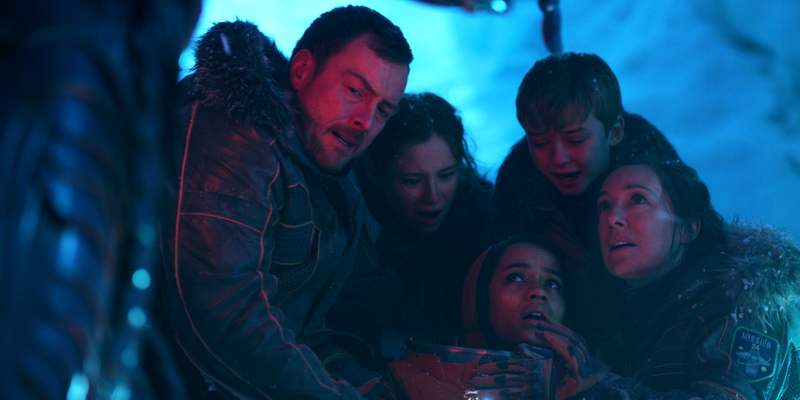 The robot (glimpsed at far left) just having a totally normal chill day with the fam.